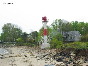 Many blocks and rocks line the beach.