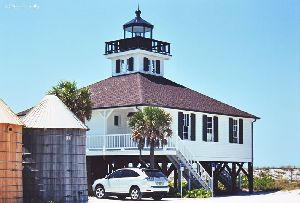 A cottage style lighthouse.