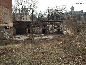 Oil vaults built into the hillside. The vaults date from 1867 and were used to house the volatile oils used in the lamps. 