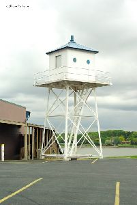 The lighthouse sits next to the bar.