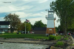The lighthouse partially painted.