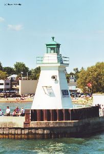 Beautiful shot of the lighthouse guarding the pier.