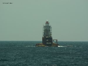 The tower sits offshore.