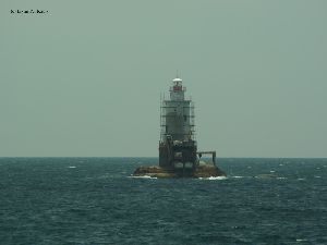 The tower sits offshore.
