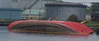 LV-114 rolled in the harbor.